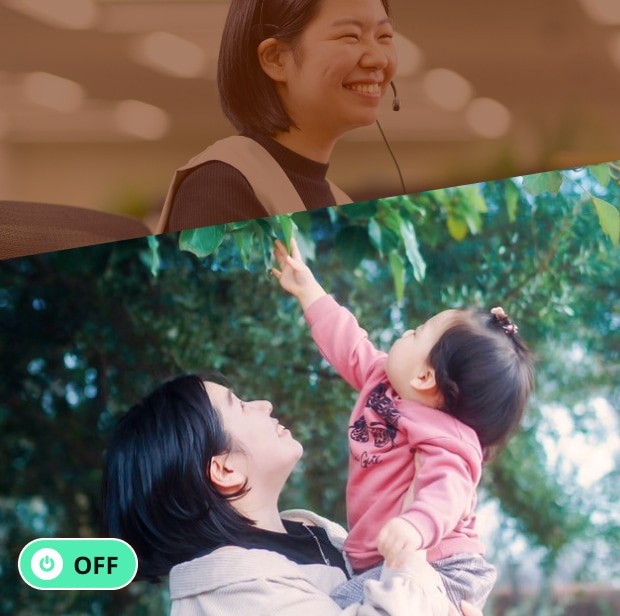 「OFF」のプライベート写真。精一杯腕を伸ばし木の葉をつかもうとしている娘を、応援するかのような抱っこで支え、一緒に葉っぱを見上げる笑顔の菅原さん